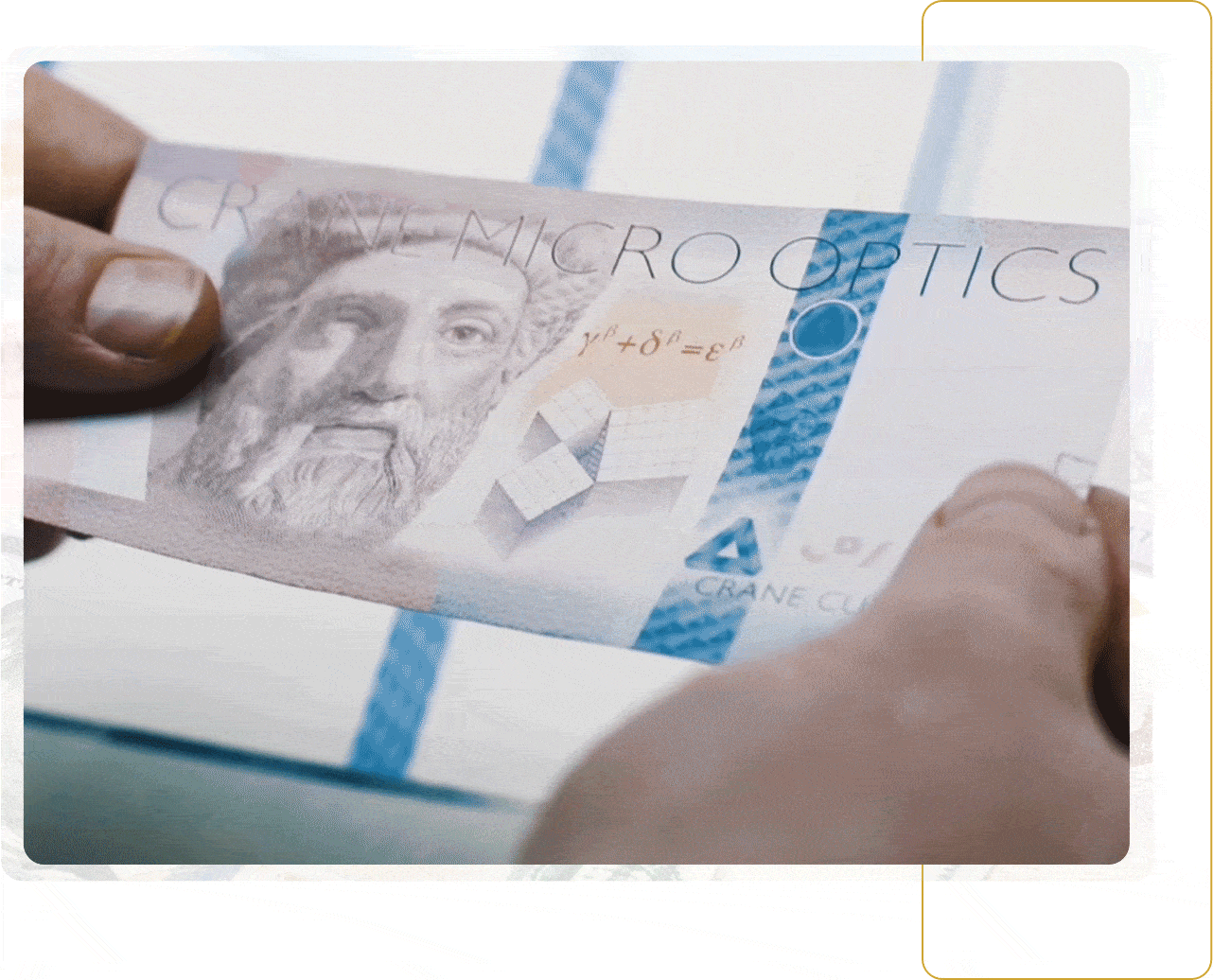 Animated gif of hologram showing up on moving paper bill