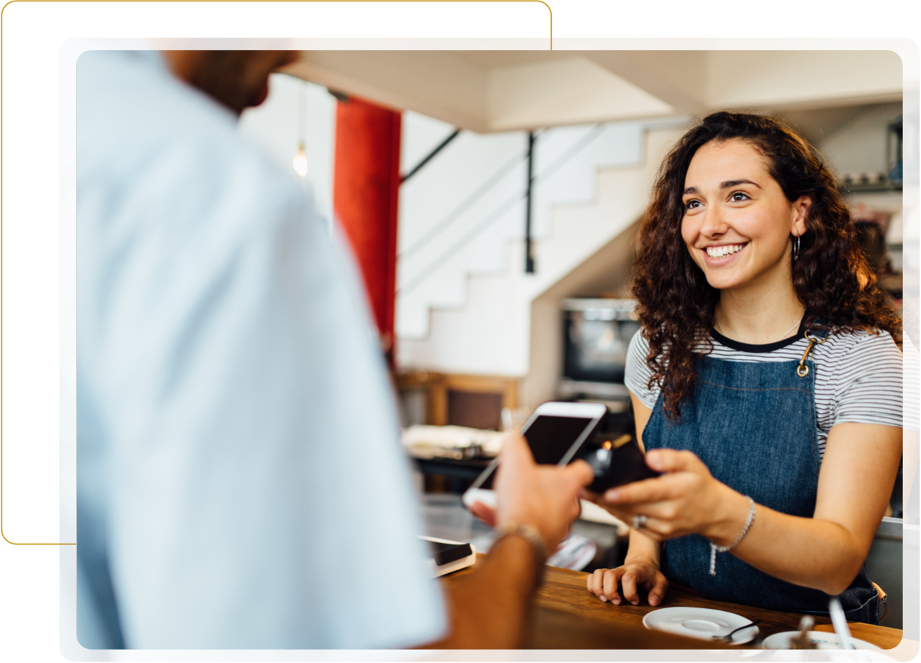 Woman taking a transaction with mobile device