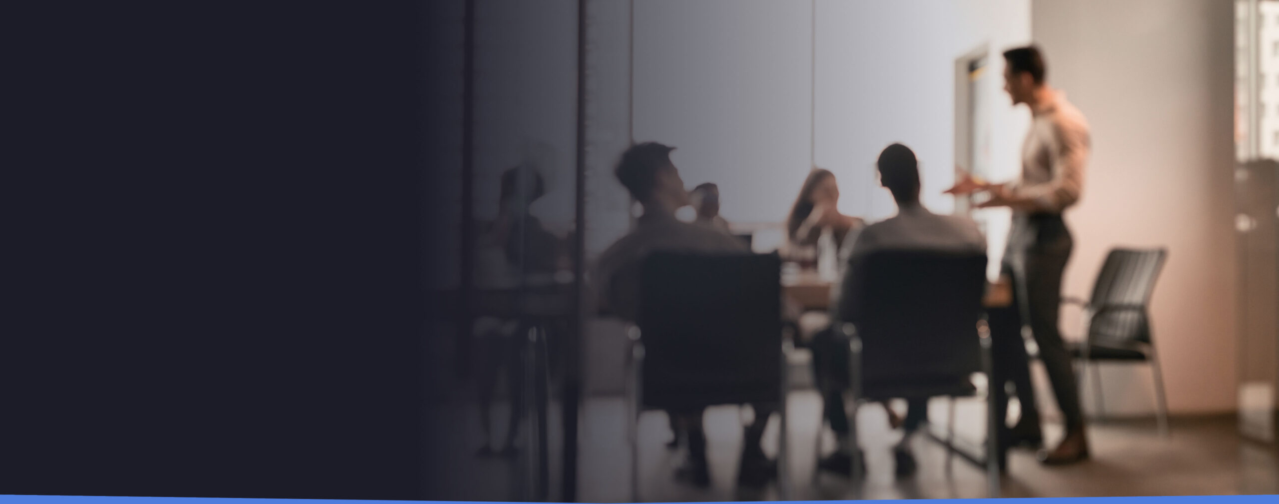 Blurred image of people in a meeting room