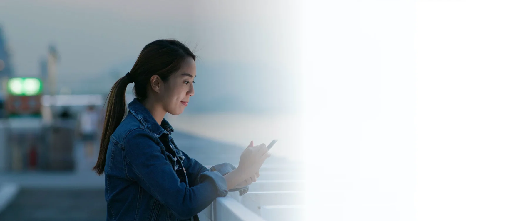 Photo of woman browsing smart phone